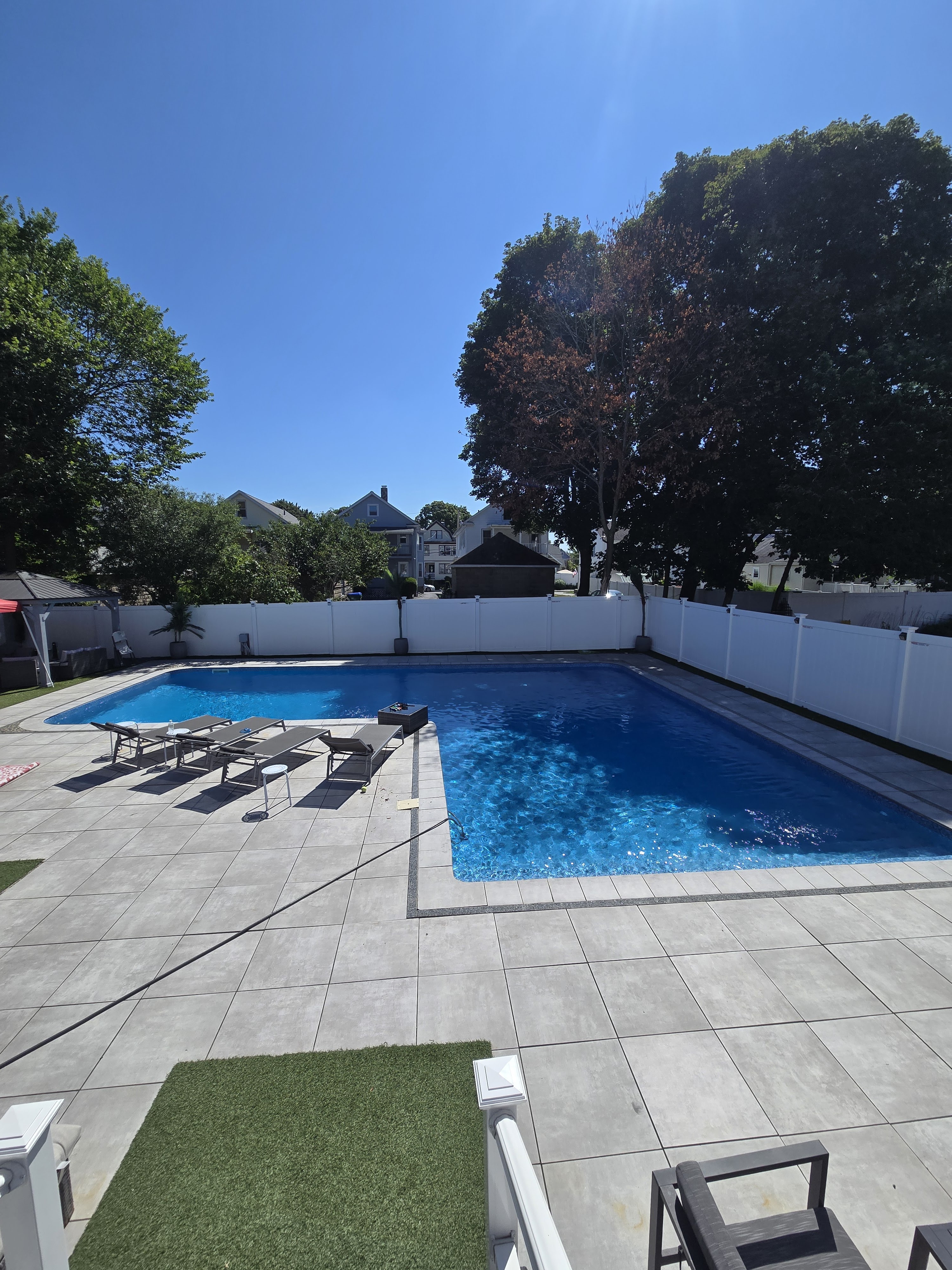 Backyard inground pool installation in Medford, MA by Mr. Pools